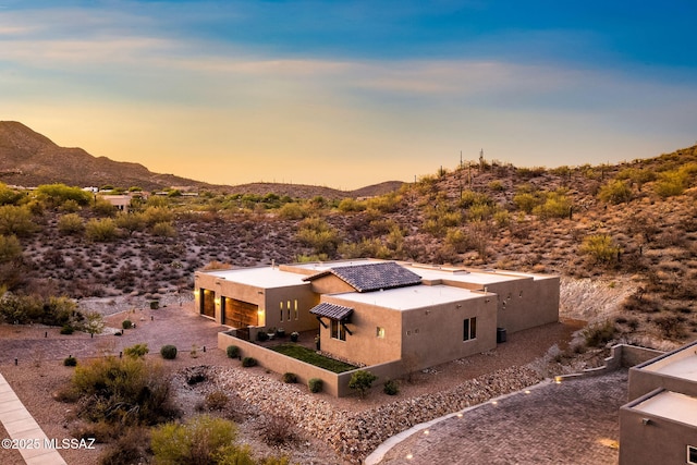 3188 W Tumamoc Dr, Tucson, AZ 85745 - aerial view at dusk of a mountain view