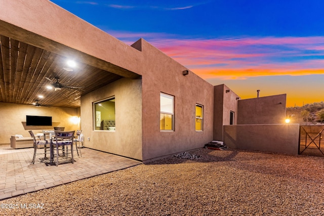 3188 W Tumamoc Dr, Tucson, AZ 85745 - back of house featuring a patio area, a ceiling fan, stucco siding, and outdoor dining area