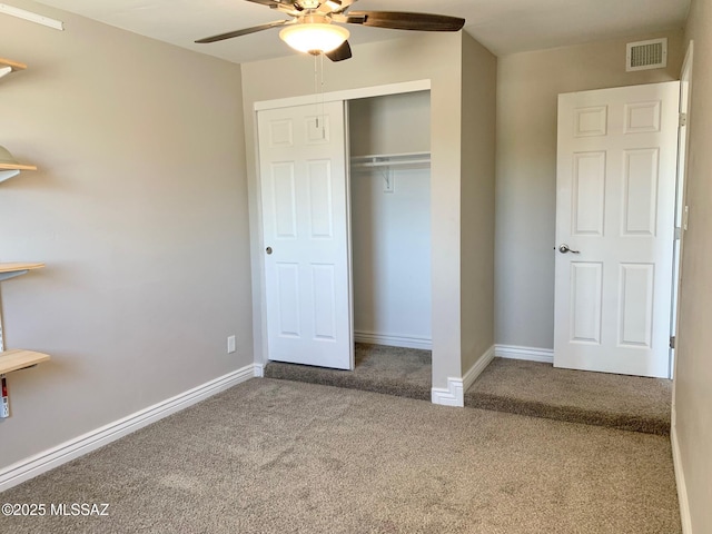 2973 S Kolb Rd, Tucson, AZ 85730 - unfurnished bedroom featuring carpet flooring, a closet, and a ceiling fan