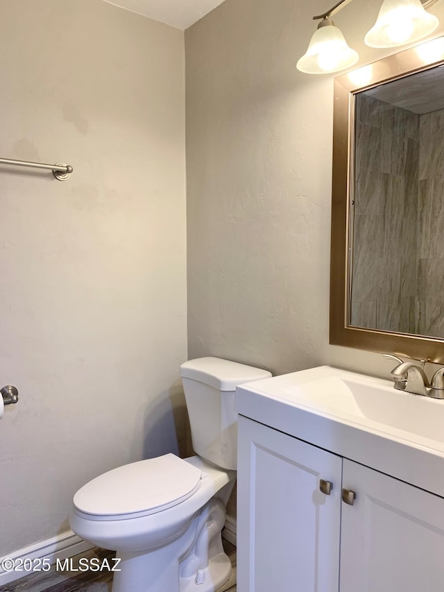 2973 S Kolb Rd, Tucson, AZ 85730 - half bathroom featuring toilet and vanity
