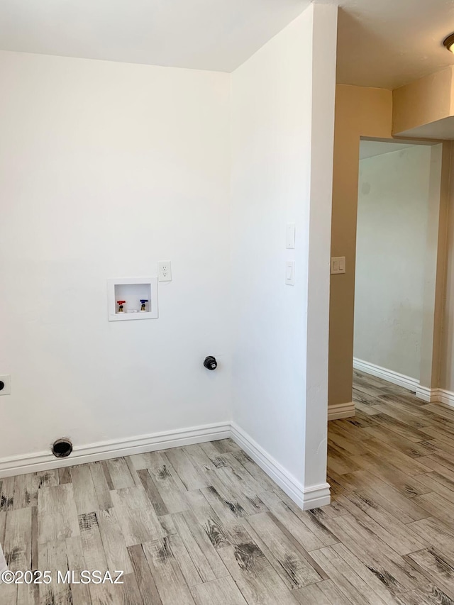 2973 S Kolb Rd, Tucson, AZ 85730 - washroom featuring hookup for an electric dryer, wood finished floors, and washer hookup