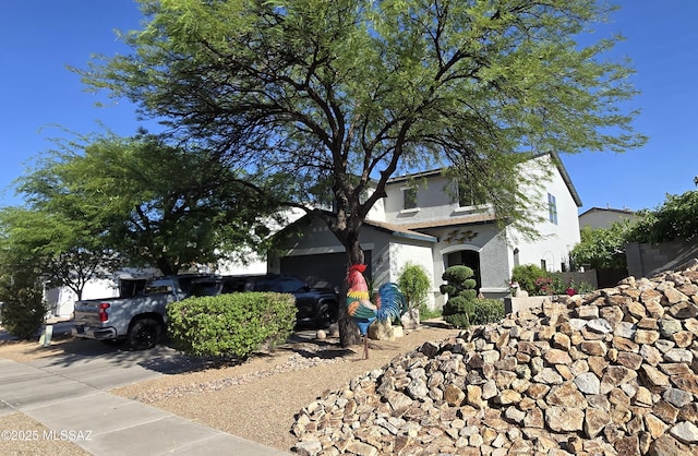 1311 W Calle Libro Del Retrato, Sahuarita, AZ 85629 - view of front facade with stucco siding, concrete driveway, and a garage