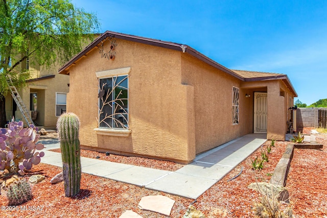 5482 S Monrovia Ave, Tucson, AZ 85706 - view of side of home with stucco siding