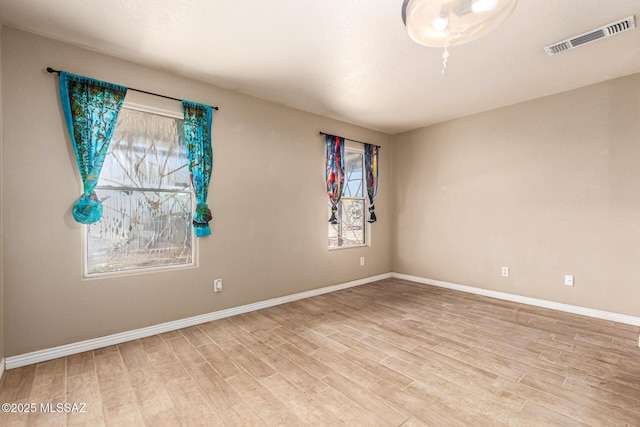 5482 S Monrovia Ave, Tucson, AZ 85706 - unfurnished room with light wood-type flooring