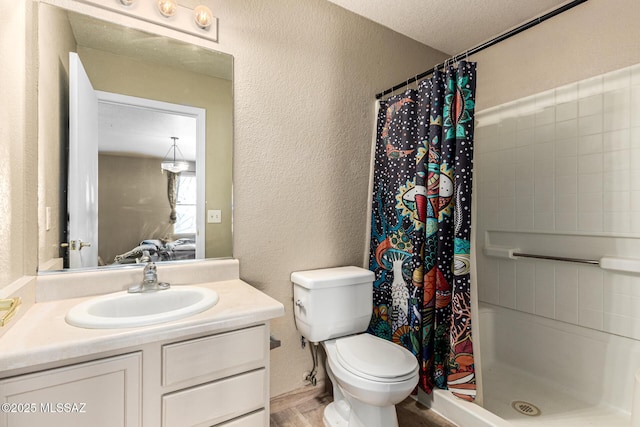 5482 S Monrovia Ave, Tucson, AZ 85706 - bathroom with a textured wall, vanity, and a shower with curtain