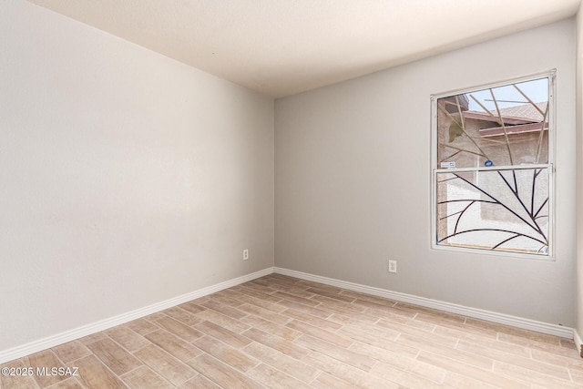 5482 S Monrovia Ave, Tucson, AZ 85706 - spare room with baseboards and light wood-style floors