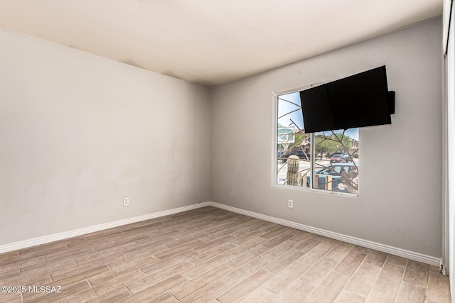 5482 S Monrovia Ave, Tucson, AZ 85706 - unfurnished room with light wood-style flooring