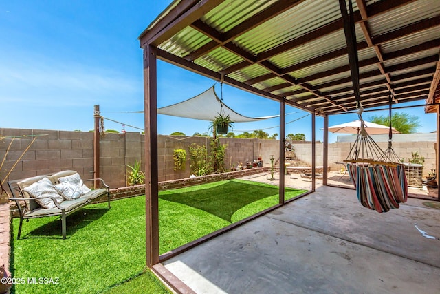 5482 S Monrovia Ave, Tucson, AZ 85706 - fenced backyard with a patio