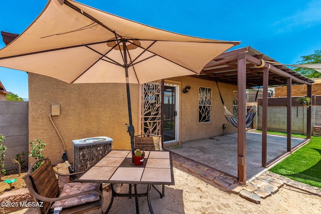 5482 S Monrovia Ave, Tucson, AZ 85706 - fenced backyard with a patio and outdoor dining area
