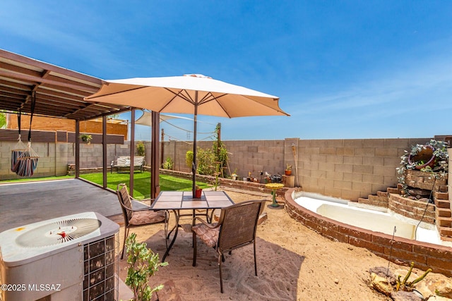 5482 S Monrovia Ave, Tucson, AZ 85706 - fenced backyard featuring a patio area and outdoor dining space