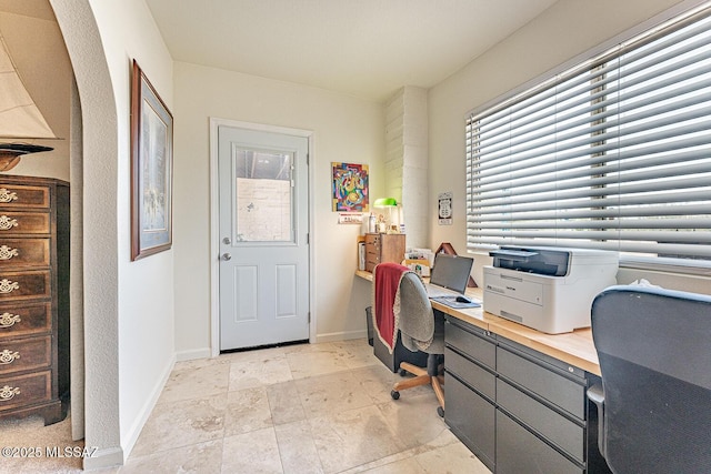 1148 W Circulo Del Norte, Green Valley, AZ 85614 - office space featuring baseboards and light stone finish floors