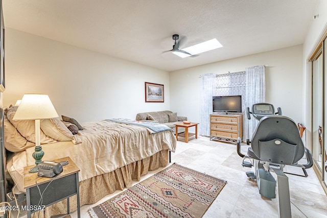 1148 W Circulo Del Norte, Green Valley, AZ 85614 - bedroom featuring a skylight and ceiling fan