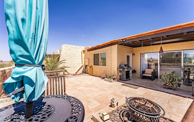 1148 W Circulo Del Norte, Green Valley, AZ 85614 - view of patio with a grill and an outdoor fire pit