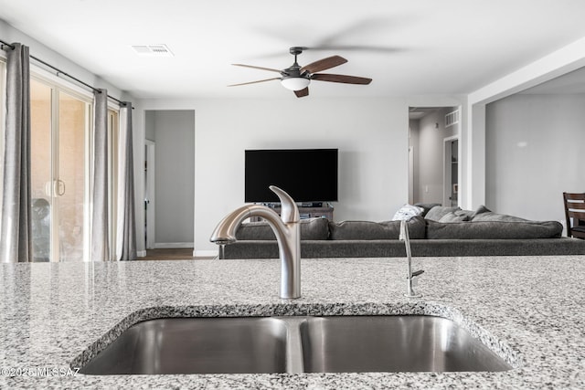 13331 N Carbine Ct, Marana, AZ 85653 - detailed view of a sink and a ceiling fan