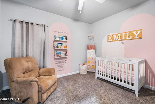 13331 N Carbine Ct, Marana, AZ 85653 - bedroom with carpet floors, a nursery area, and ceiling fan
