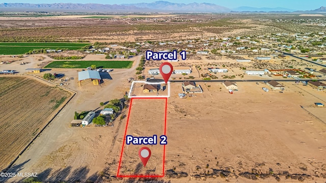 13331 N Carbine Ct, Marana, AZ 85653 - overview of rural landscape featuring a mountainous background and property parcel outlined
