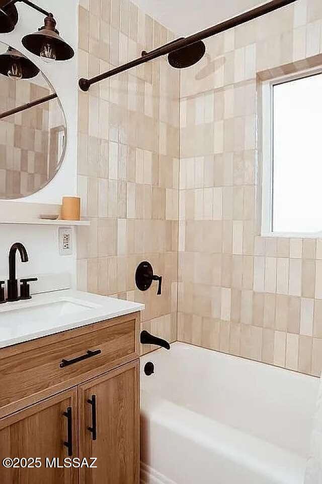 2602 E Prince Rd, Tucson, AZ 85716 - bathroom with vanity and  shower combination