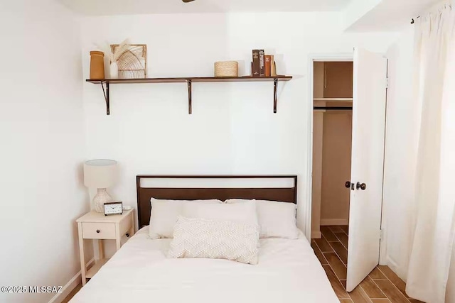 2602 E Prince Rd, Tucson, AZ 85716 - bedroom with wood finished floors and baseboards
