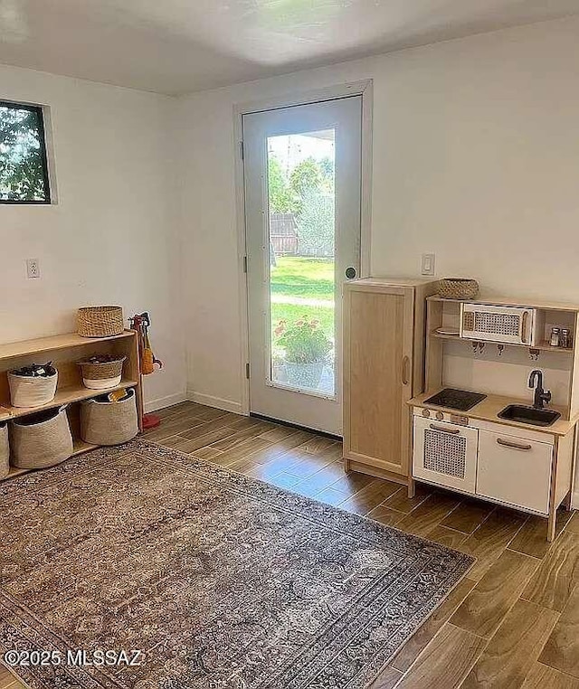 2602 E Prince Rd, Tucson, AZ 85716 - doorway featuring dark wood finished floors