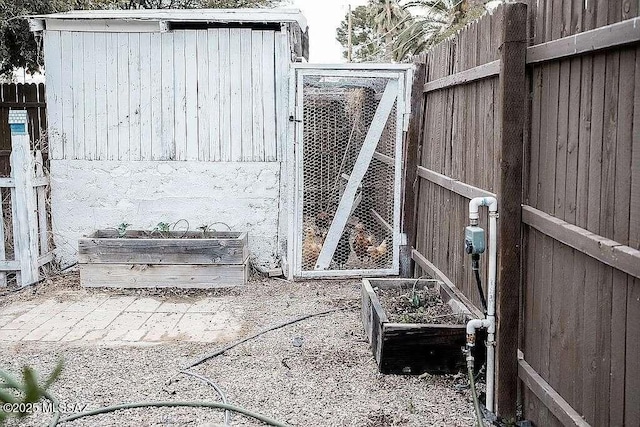 2602 E Prince Rd, Tucson, AZ 85716 - view of patio / terrace featuring exterior structure and an outbuilding