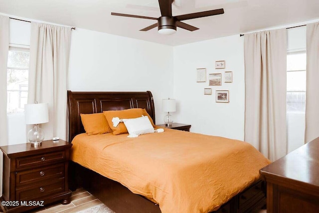2602 E Prince Rd, Tucson, AZ 85716 - bedroom with ceiling fan and wood finished floors
