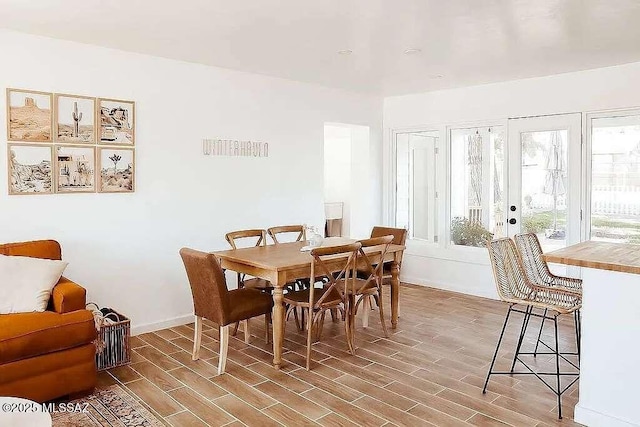 2602 E Prince Rd, Tucson, AZ 85716 - dining area featuring wood finished floors and french doors