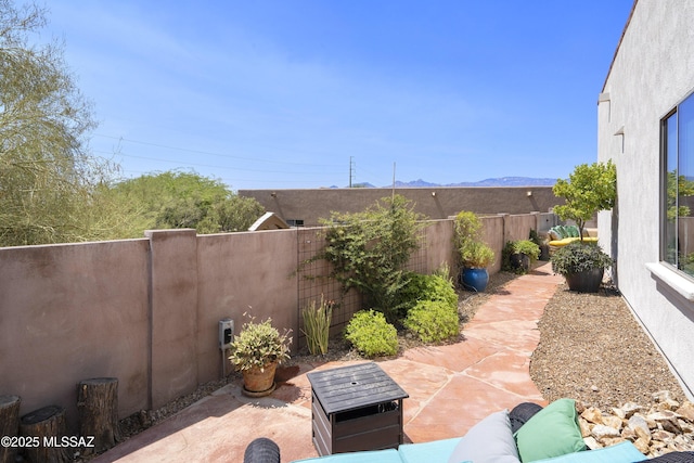 3923 S Camino Ensenada Del Pantano, Tucson, AZ 85730 - fenced backyard featuring a patio area