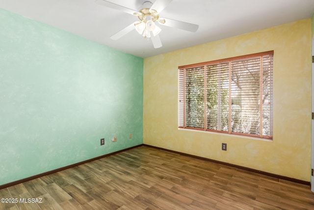 8410 E Heath Ct, Tucson, AZ 85715 - empty room with wood finished floors and a ceiling fan