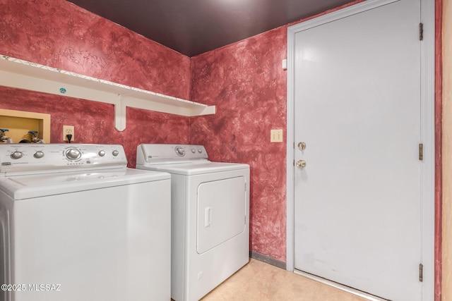 8410 E Heath Ct, Tucson, AZ 85715 - laundry room with washing machine and dryer and light tile patterned flooring