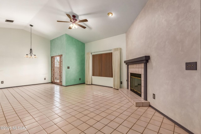 8410 E Heath Ct, Tucson, AZ 85715 - unfurnished living room featuring high vaulted ceiling, a ceiling fan, light tile patterned floors, and a tile fireplace