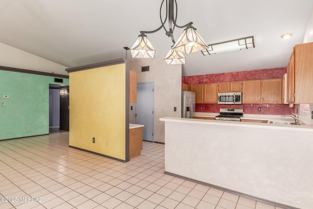 8410 E Heath Ct, Tucson, AZ 85715 - kitchen with appliances with stainless steel finishes, light countertops, a peninsula, light tile patterned floors, and high vaulted ceiling
