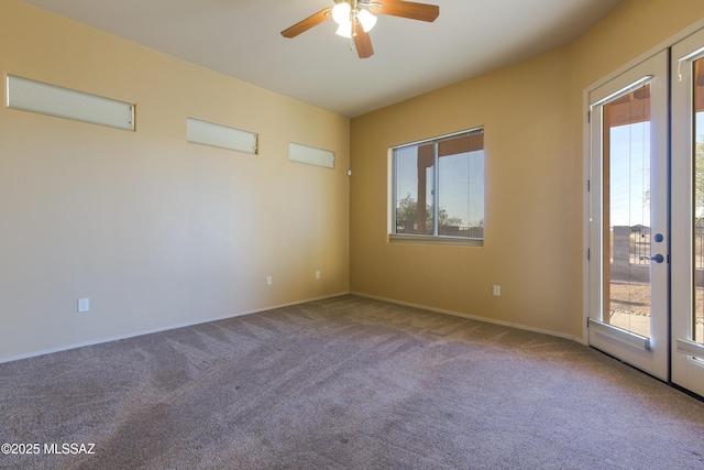 17160 W Starr Rd, Marana, AZ 85653 - carpeted empty room featuring plenty of natural light, ceiling fan, and french doors