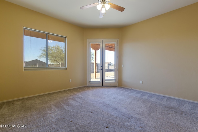 17160 W Starr Rd, Marana, AZ 85653 - carpeted spare room with french doors and a ceiling fan