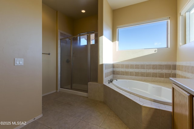 17160 W Starr Rd, Marana, AZ 85653 - full bathroom featuring healthy amount of natural light, a bath, a shower stall, and tile patterned floors