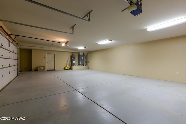 17160 W Starr Rd, Marana, AZ 85653 - garage featuring electric water heater, a garage door opener, and heating unit
