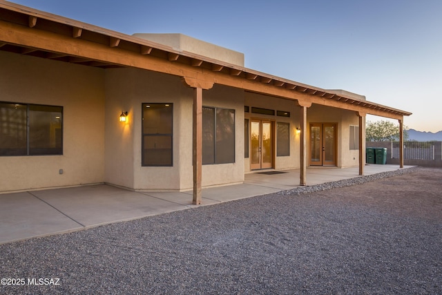 17160 W Starr Rd, Marana, AZ 85653 - back of house with french doors, a patio area, and stucco siding