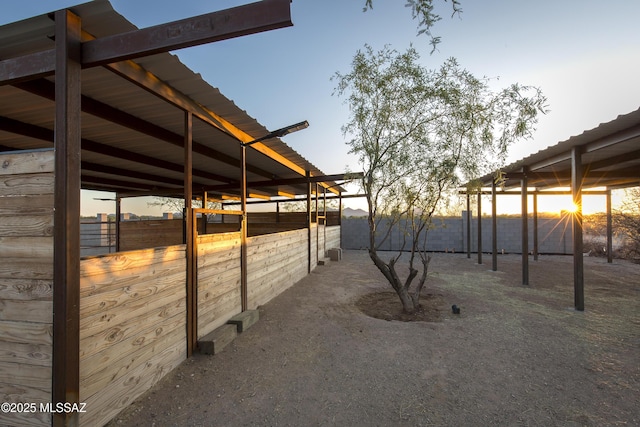 17160 W Starr Rd, Marana, AZ 85653 - yard at dusk with an exterior structure and an outdoor structure