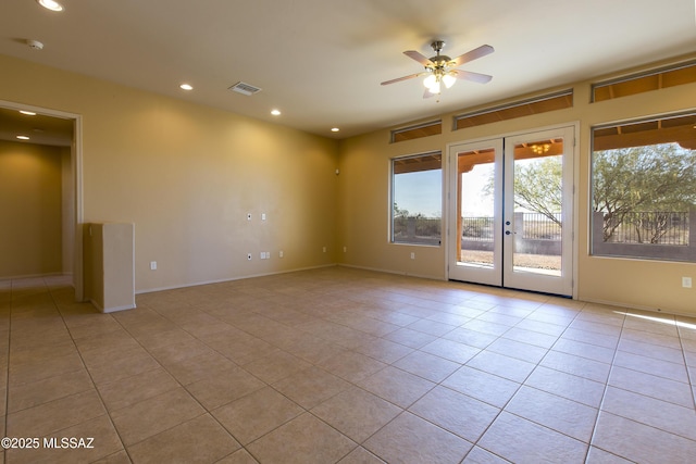 17160 W Starr Rd, Marana, AZ 85653 - spare room featuring light tile patterned floors, french doors, a ceiling fan, recessed lighting, and a smoke detector