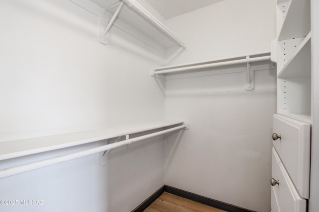 5751 N Kolb Rd Unit 39202, Tucson, AZ 85750 - walk in closet with wood finished floors