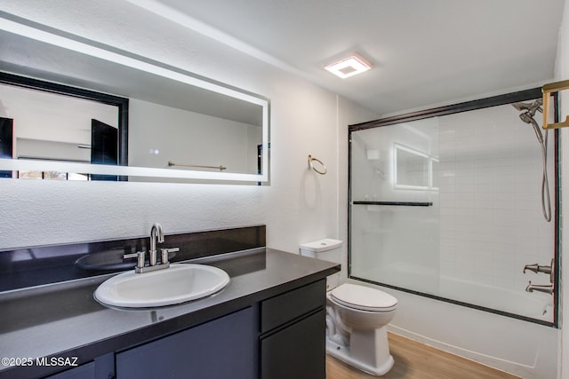 5751 N Kolb Rd Unit 39202, Tucson, AZ 85750 - full bathroom with vanity, wood finished floors, and shower / bath combination with glass door