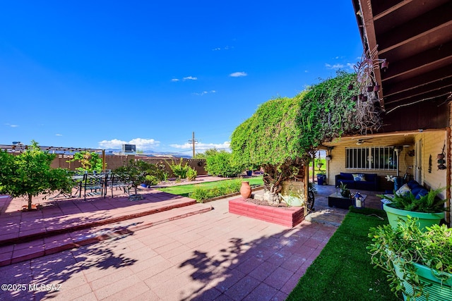 8681 E Desert Palm St, Tucson, AZ 85730 - fenced backyard with a patio area, outdoor lounge area, and outdoor dining area
