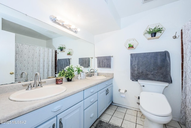 8681 E Desert Palm St, Tucson, AZ 85730 - bathroom with double vanity and tile patterned floors