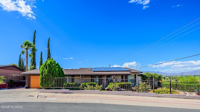 8681 E Desert Palm St, Tucson, AZ 85730 - single story home with solar panels and a mountain view