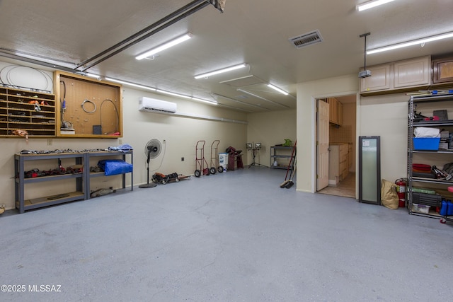 2856 W Goldfield Dr, Tucson, AZ 85745 - garage with a wall mounted AC