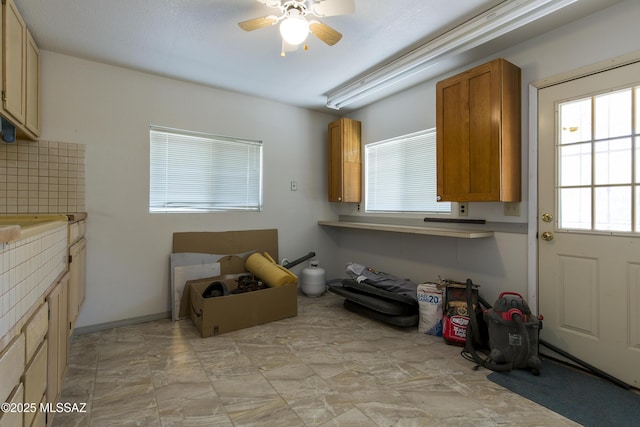 2856 W Goldfield Dr, Tucson, AZ 85745 - laundry room with ceiling fan