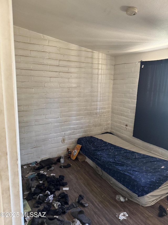 206 W Blacklidge Dr, Tucson, AZ 85705 - unfurnished bedroom featuring wood finished floors