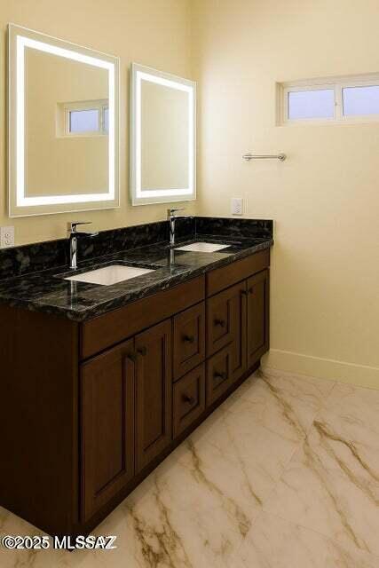 1886 Via Francia, Rio Rico, AZ 85648 - bathroom with marble look tiles and double vanity