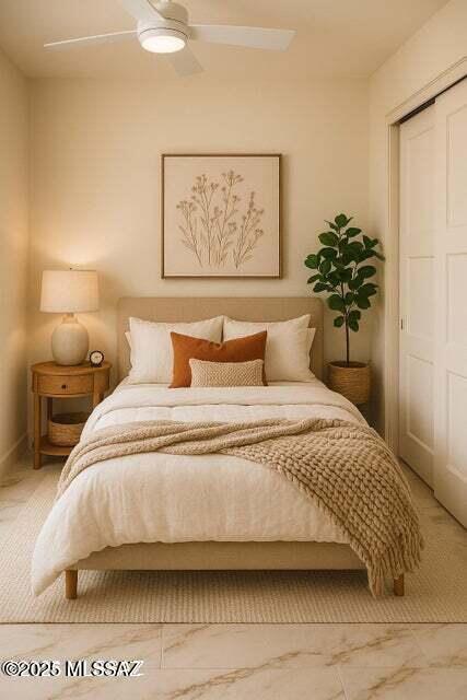 1886 Via Francia, Rio Rico, AZ 85648 - carpeted bedroom featuring a closet, a ceiling fan, and marble look tile flooring