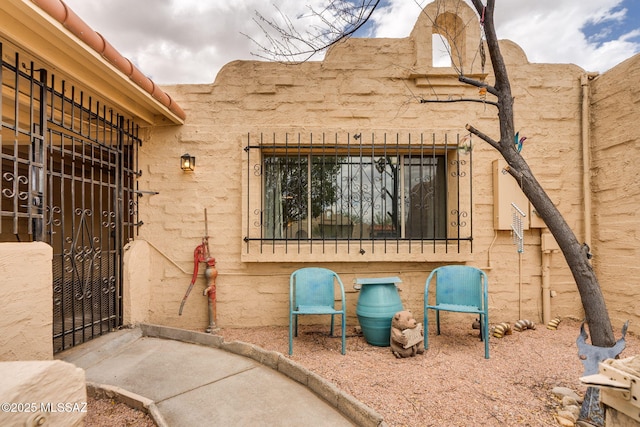 4211 N Villas Placitas, Tucson, AZ 85705 - view of exterior entry with a gate