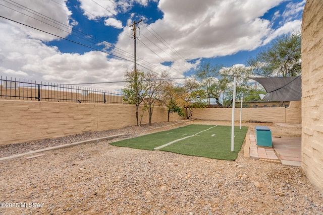 4211 N Villas Placitas, Tucson, AZ 85705 - fenced backyard featuring a putting area